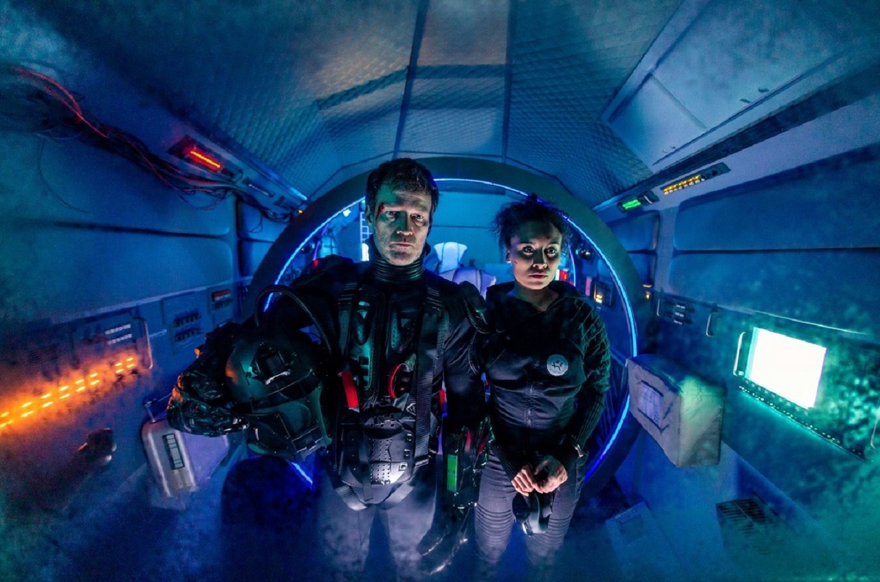 Stephen Moyer and Tala Gouveia in G-Loc (2020)