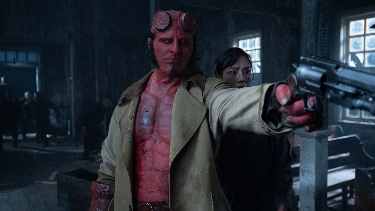 Hellboy (Jack Kesy) and Bobbie Jo Song (Adeline Rudolph) in Hellboy: The Crooked Man (2024)