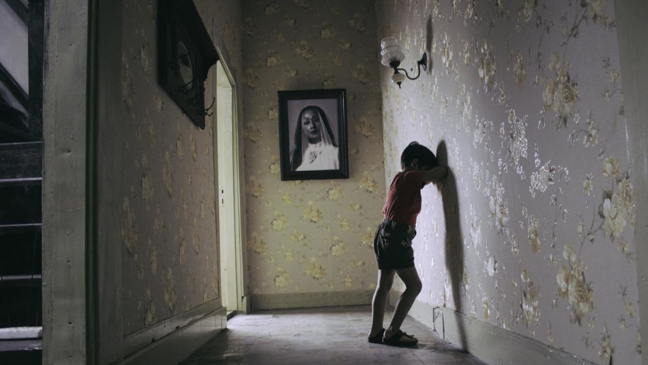 The portrait in Satan's Slave (2017)